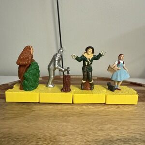 Blockbuster Wizard Set of Oz 4 Movable Toys 1997 Dorothy Scarecrow Tin Man Lion